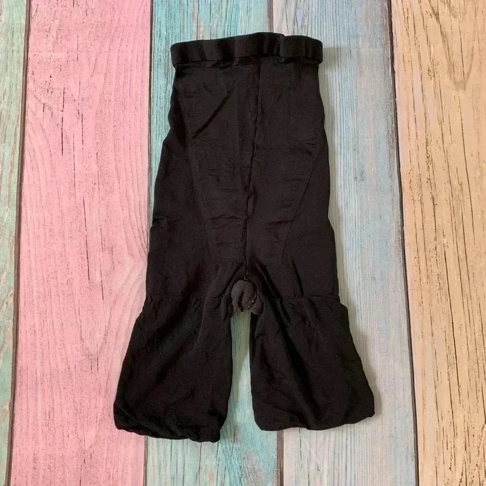 Black Spanx compressing shapewear